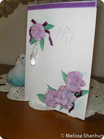 Close up of 50th birthday card with flowers