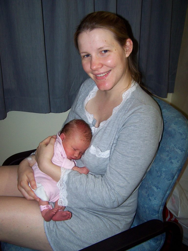 Melissa Shanhun holding a baby